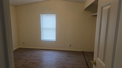 128 Center St, Unit 1 in Oak Hill, FL - Building Photo - Building Photo