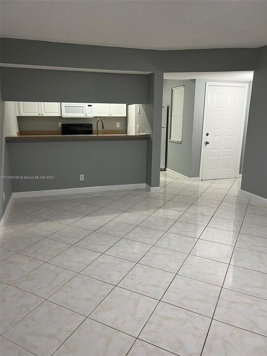 11585 NW 43rd Ct-Unit -11585 in Coral Springs, FL - Building Photo