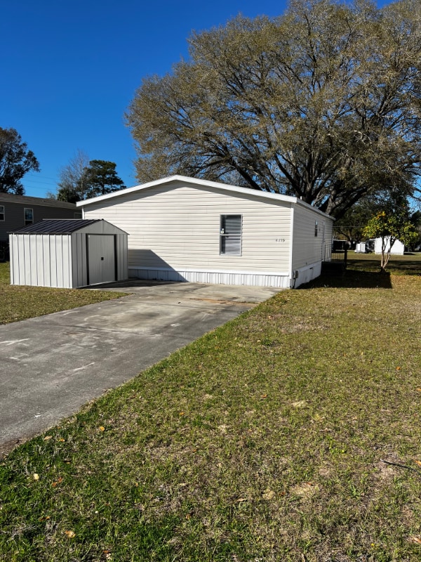 6859 NE 1st Pl in Ocala, FL - Foto de edificio - Building Photo