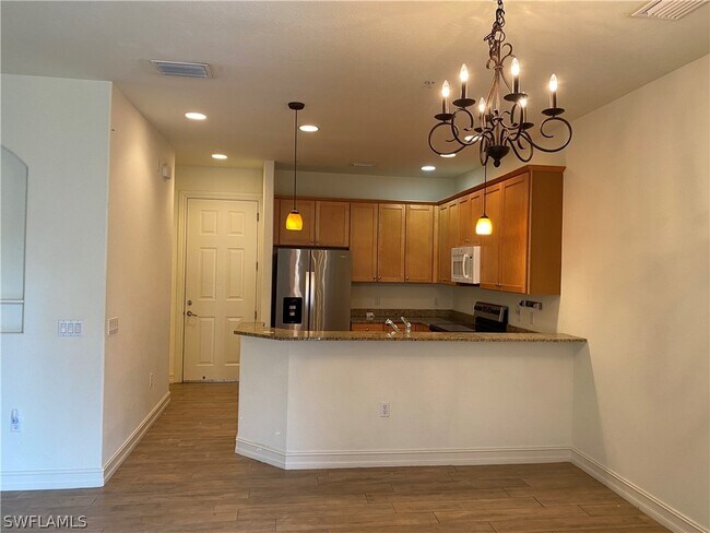 9151 Delano St in Naples, FL - Foto de edificio - Building Photo