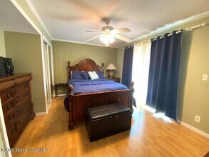 8759 Live Oak Ct in Cape Canaveral, FL - Building Photo - Building Photo