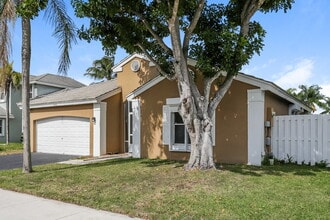 5262 NW 55th Terrace in Coconut Creek, FL - Building Photo - Building Photo