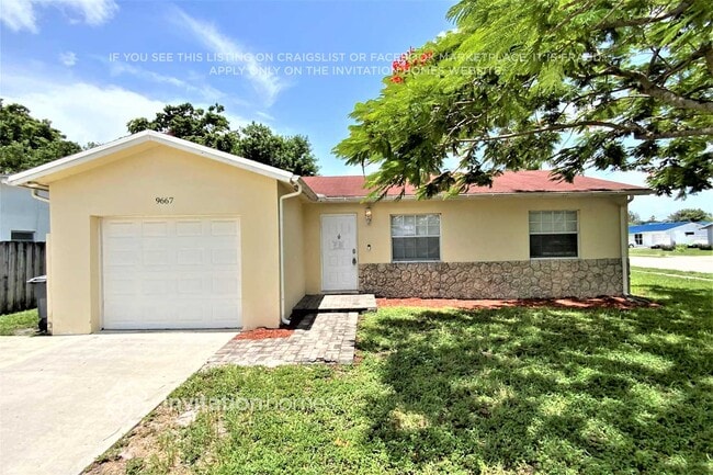 property at 9667 SW 3rd St
