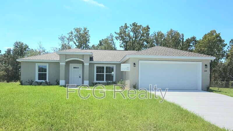 3328 W Naegelia Pl in Citrus Springs, FL - Building Photo