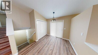7418 A-7114 114 St in Grande Prairie, AB - Building Photo - Building Photo