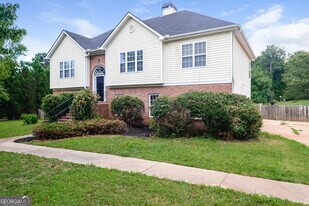 144 Leguin Forest Dr in Locust Grove, GA - Building Photo