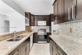 11909 SW 48th Ct in Cooper City, FL - Building Photo - Building Photo