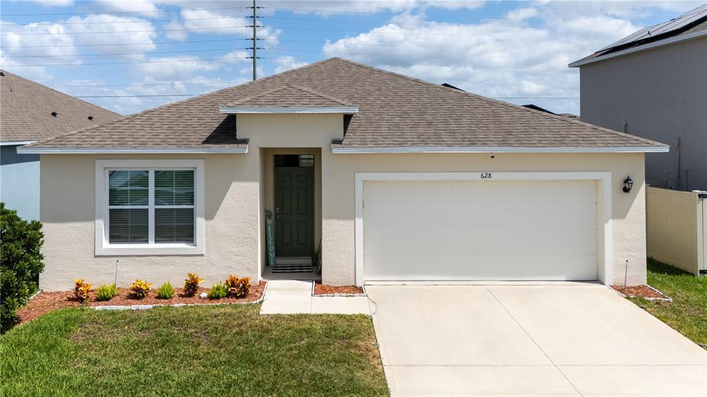 628 Talisi Lp in St. Cloud, FL - Foto de edificio