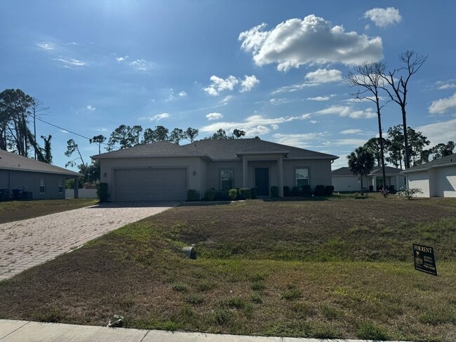 2233 S Chamberlain Blvd in North Port, FL - Building Photo - Building Photo