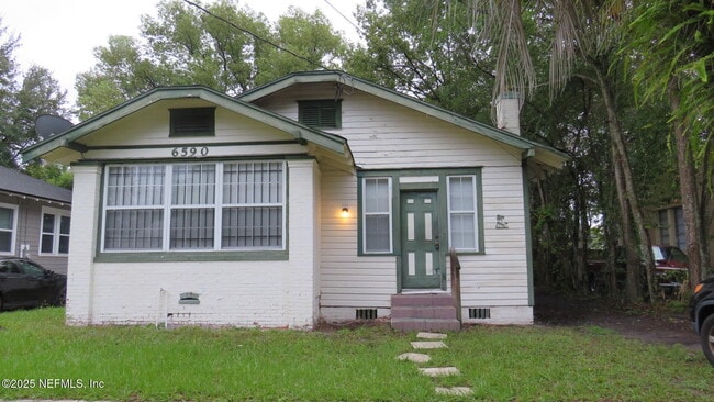 property at 6590 Sunset Dr