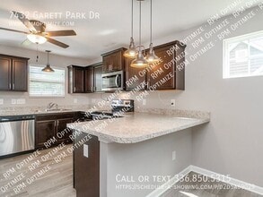 7432 Garett Park Dr in Whitsett, NC - Building Photo - Building Photo