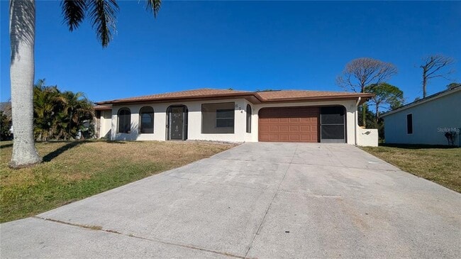 874 Dolphin Ave NW in Port Charlotte, FL - Building Photo - Building Photo