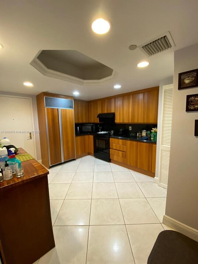 property at 9559 Collins Ave