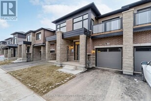 1496 Rose Way in Milton, ON - Building Photo