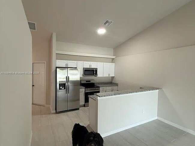 1413 Academy Blvd in Cape Coral, FL - Building Photo - Building Photo