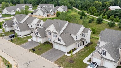 1867 Woodland Way, Unit Arbor Pointe in Slinger, WI - Building Photo - Building Photo