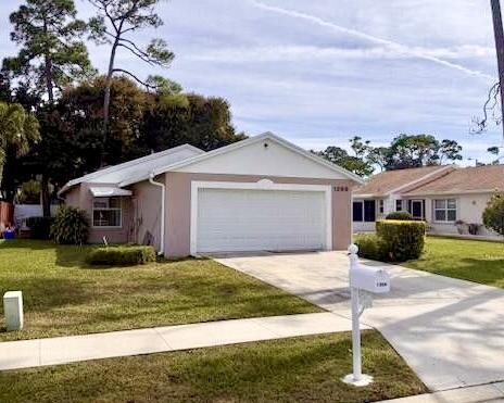 1268 Slash Pine Cir in West Palm Beach, FL - Building Photo