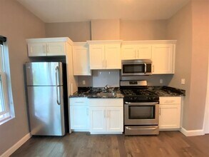 41 Saratoga St, Unit 4E in Boston, MA - Foto de edificio - Building Photo