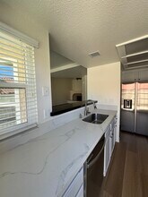 12582 Calle Tamega, Unit Unit 103 in San Diego, CA - Building Photo - Building Photo