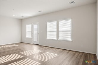 12811 Village Spun Plz in Mustang Ridge, TX - Building Photo - Building Photo