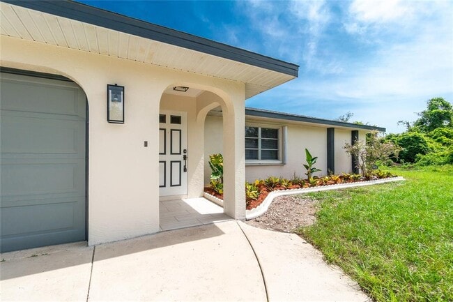 1196 Ample Ave in Port Charlotte, FL - Building Photo - Building Photo