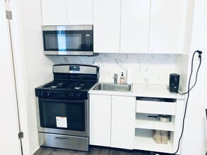 118 Corbin Ave-Unit -403 in Jersey City, NJ - Building Photo - Building Photo