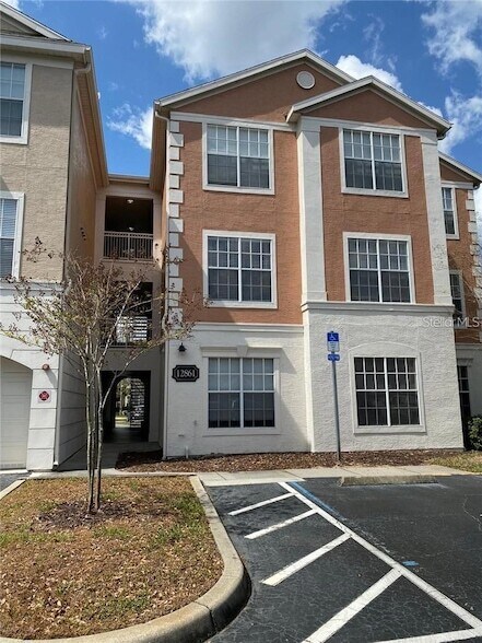 12861 Madison Pointe Cir, Unit 207 in Orlando, FL - Foto de edificio