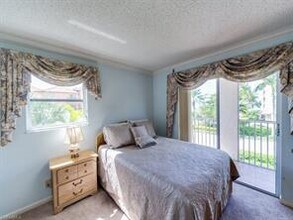 9486 Gulf Shore Dr-Unit -A-201 in Naples, FL - Building Photo - Building Photo