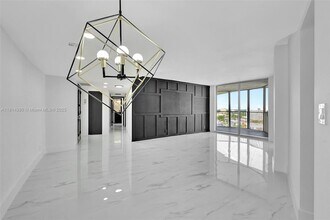 100 Golden Isles Dr, Unit 1410 in Hallandale Beach, FL - Building Photo - Building Photo