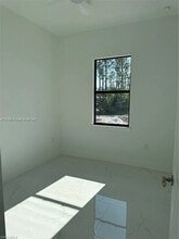 1028 Eubanks St in Lehigh Acres, FL - Foto de edificio - Building Photo