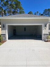 57 Wellstream Ln, Unit #A in Palm Coast, FL - Foto de edificio - Building Photo