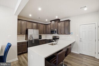 10501 John Glenn St in Lanham, MD - Building Photo - Building Photo