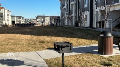 6153 N Ceylon St, Unit 10-308 in Denver, CO - Building Photo - Building Photo