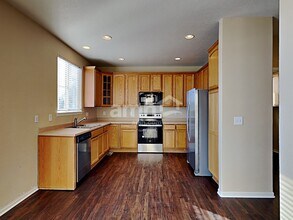 17630 E 104th Pl in Commerce City, CO - Building Photo - Building Photo