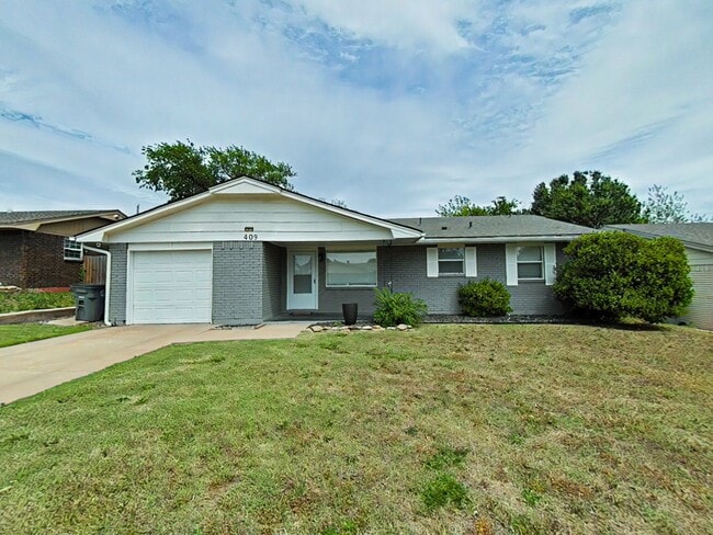 property at 409 NW 75th St