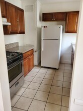 127 N Clark Dr, Unit 1/4 in Beverly Hills, CA - Building Photo - Building Photo