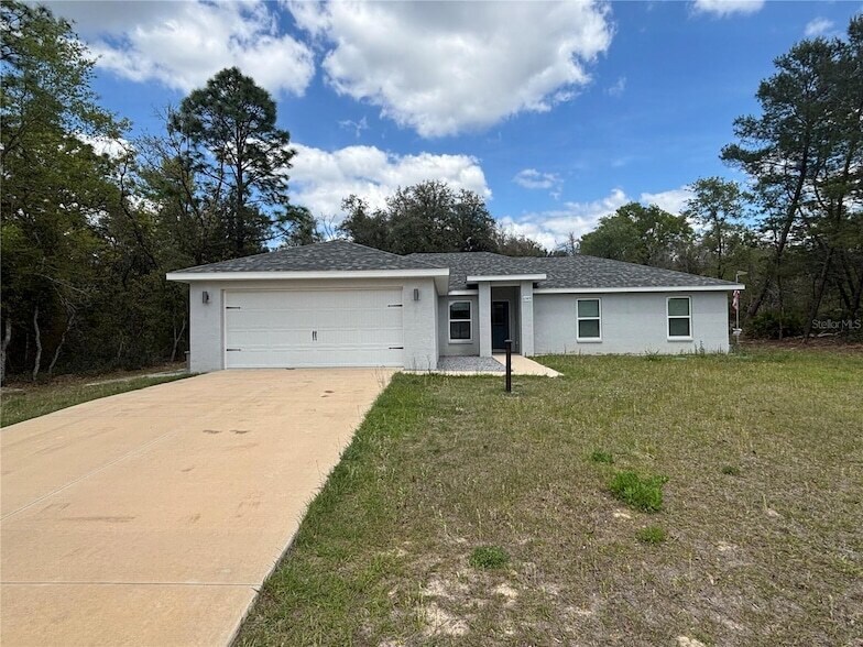 6589 N Bedstrow Blvd, Unit 523 in Citrus Springs, FL - Building Photo