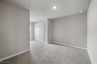 15563 Wildflower Cir in Naples, FL - Foto de edificio - Building Photo