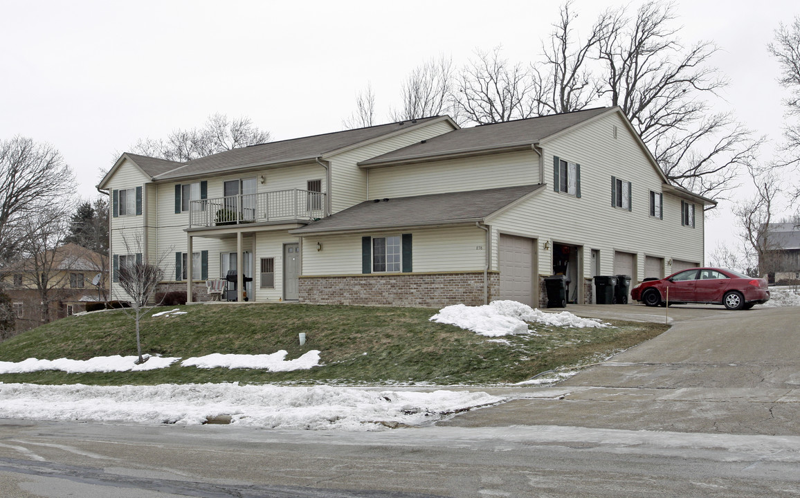 Dekora Woods Apartments in Allenton, WI - Building Photo