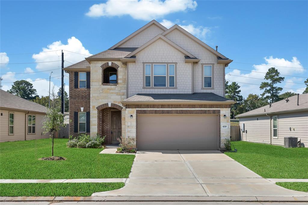 41519 Stampede Strm in Magnolia, TX - Building Photo