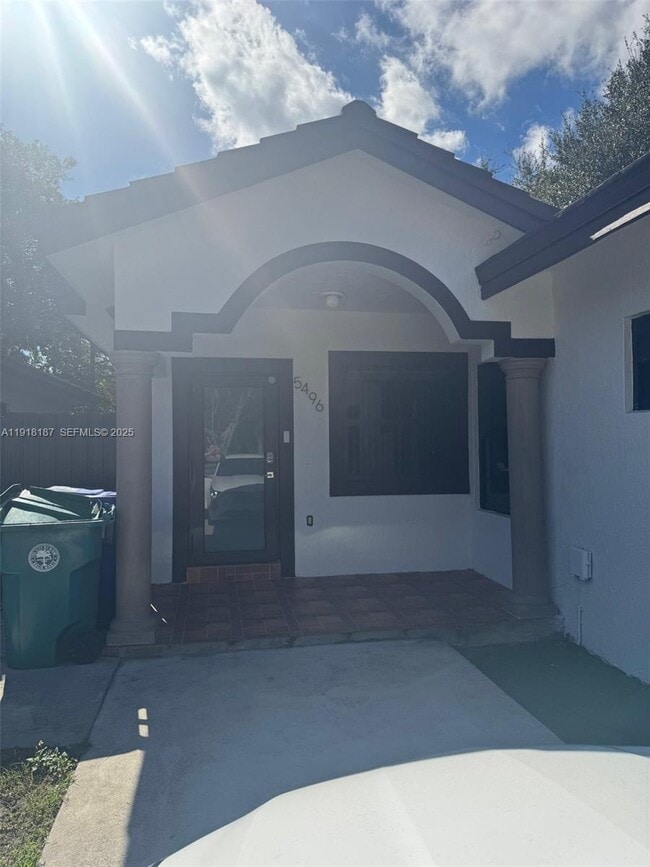 property at 5496 NW 4th St