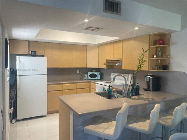 property at 10857 NW 7th St