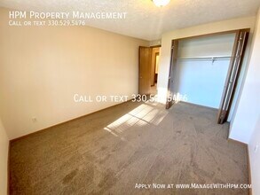 1876 Ledgewood Blvd NE-Unit -A9 in Massillon, OH - Building Photo - Building Photo