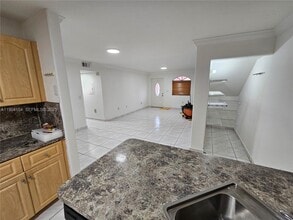 10915 W Okeechobee Rd in Hialeah Gardens, FL - Building Photo - Building Photo