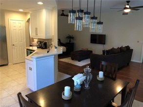 10030 Valiant Ct-Unit -102 in Miromar Lakes, FL - Building Photo - Building Photo