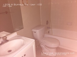 1209 N Buffalo Dr-Unit -Unit 102 in Las Vegas, NV - Building Photo - Building Photo