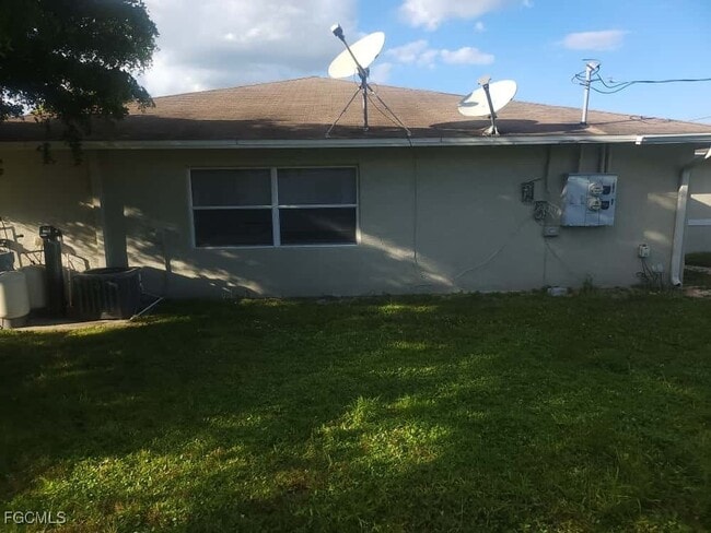 1122 Harry Ave S in Lehigh Acres, FL - Building Photo - Building Photo