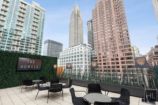 84 William St-Unit -1406 in New York, NY - Building Photo - Building Photo