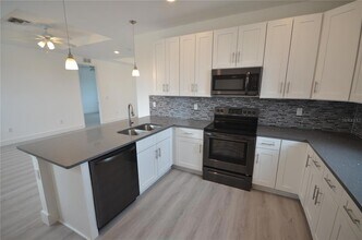 8581 Agate St, Unit 03-21 in Port Charlotte, FL - Building Photo - Building Photo