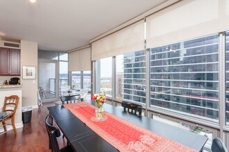 100 E 14th St, Unit 906 in Chicago, IL - Building Photo - Building Photo